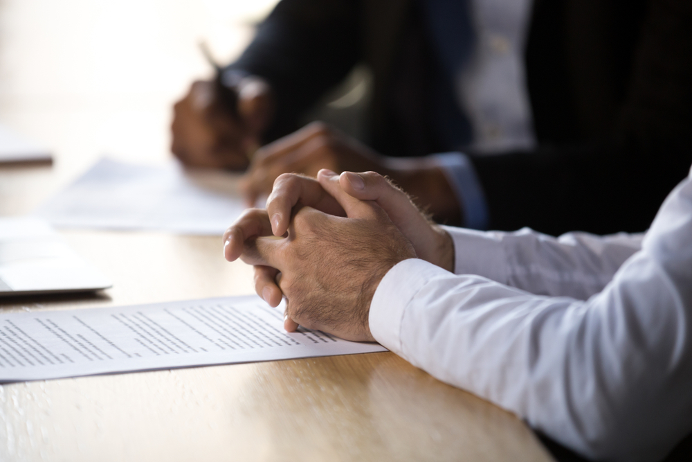 Photo of Two Person Discussing